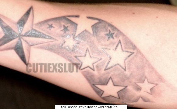 gusti si-a facut tatuaj sooper ala mana    